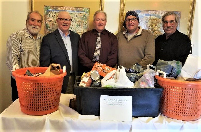 DONATION: The RI Party & Charter Boat Association held their annual banquet Sunday at Spain Restaurant, Narragansett.  Pictured with food donations for the Johnnycake Center are Captains John Rainone, Past President; Paul Johnson, Secretary; Rick Bellavance, President; Steven Anderson, Vice President; and Andy Dangelo, Treasurer.